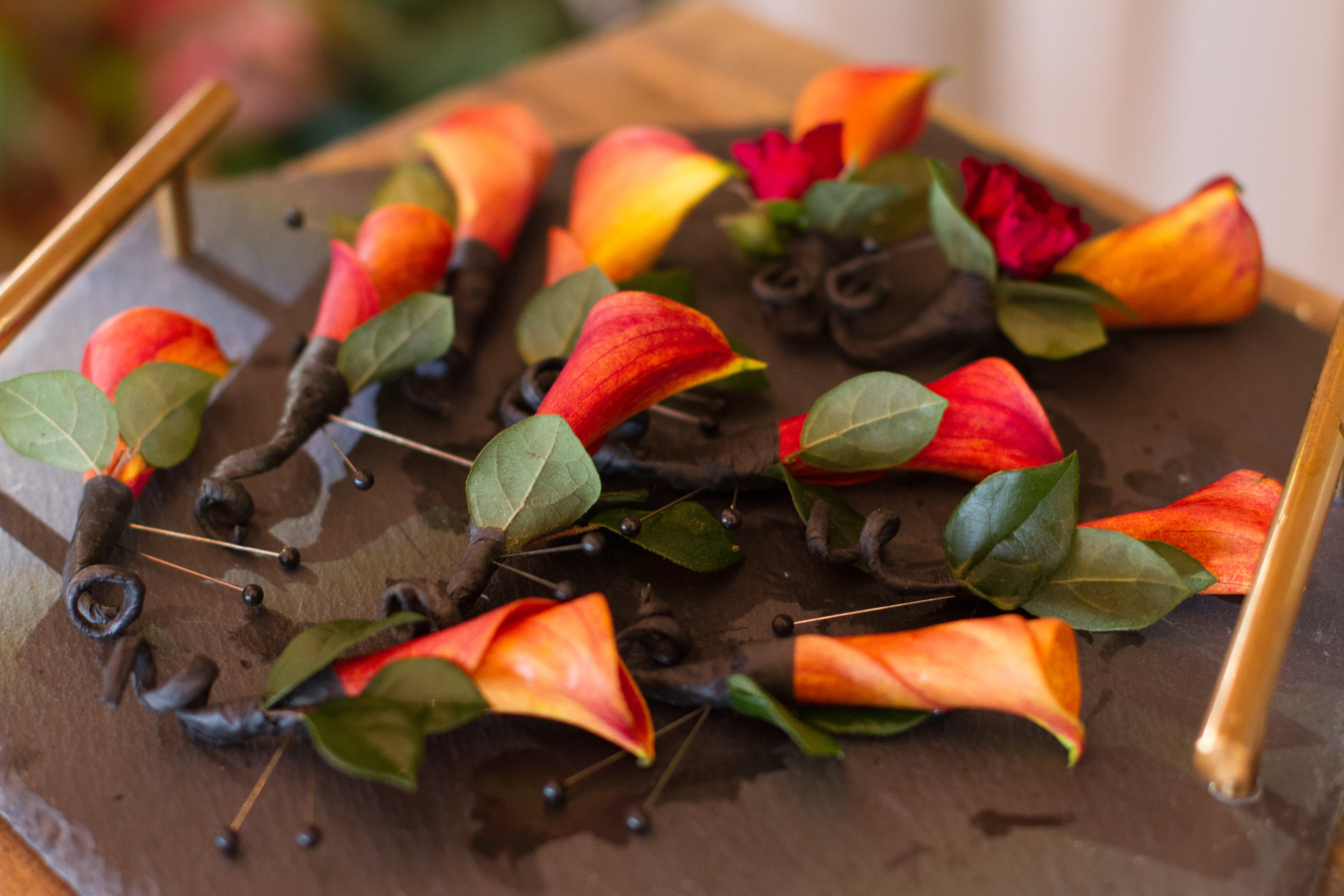 Mini Orange Calla Lily Fall Wedding Boutonniere from Topher Mack Floral & Events in Atlanta