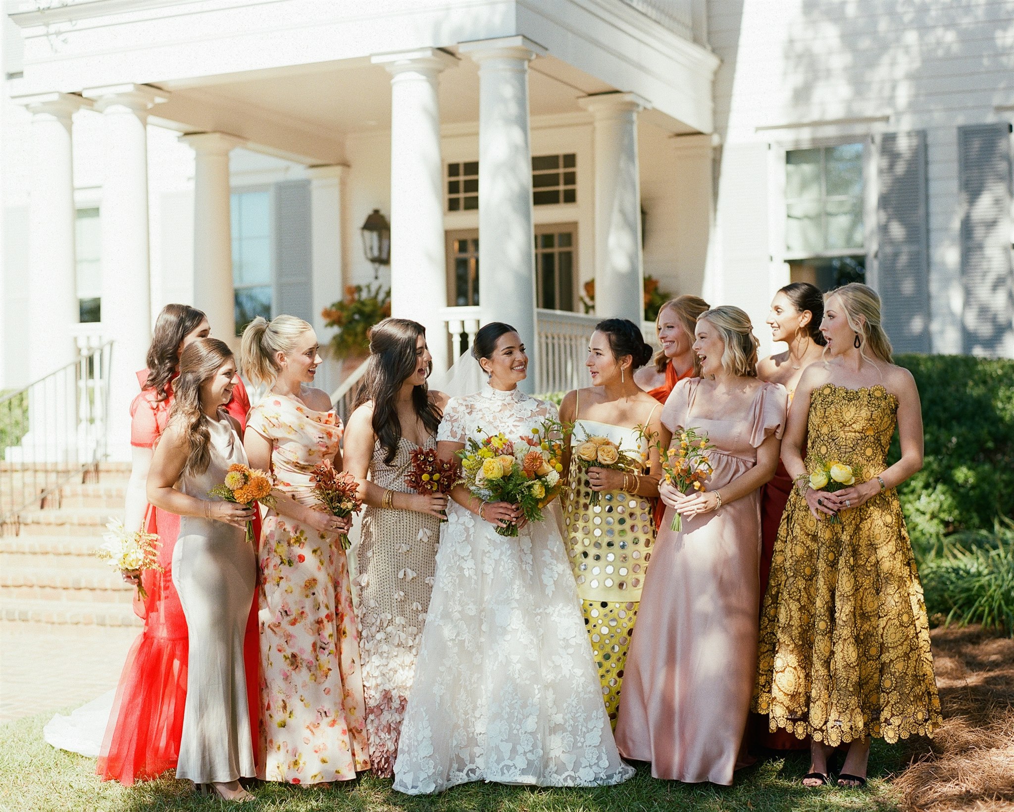 Bride and bridal party holding custom wedding bouquets designed by Topher Mack Floral & Events in Atlanta